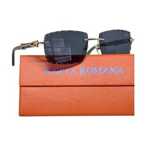 Porta Romana Sunglasses with acqyamarina color lenses and wooden temples